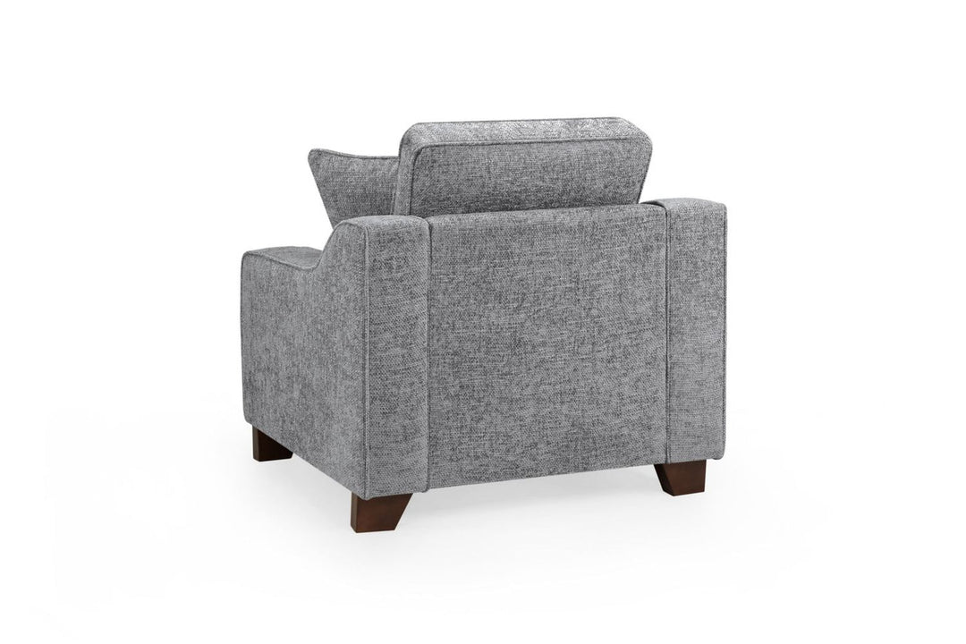 Gray upholstered armchair on a white background