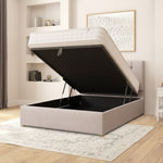 Load image into Gallery viewer, Beige bed with open storage compartment in a room with shelves and a rug.