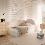 Load image into Gallery viewer, Children's bedroom with a cloud-shaped bed and decorative elements.