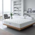 Load image into Gallery viewer, White mattress on a wooden bed frame in a modern bedroom with bookshelves and decor.