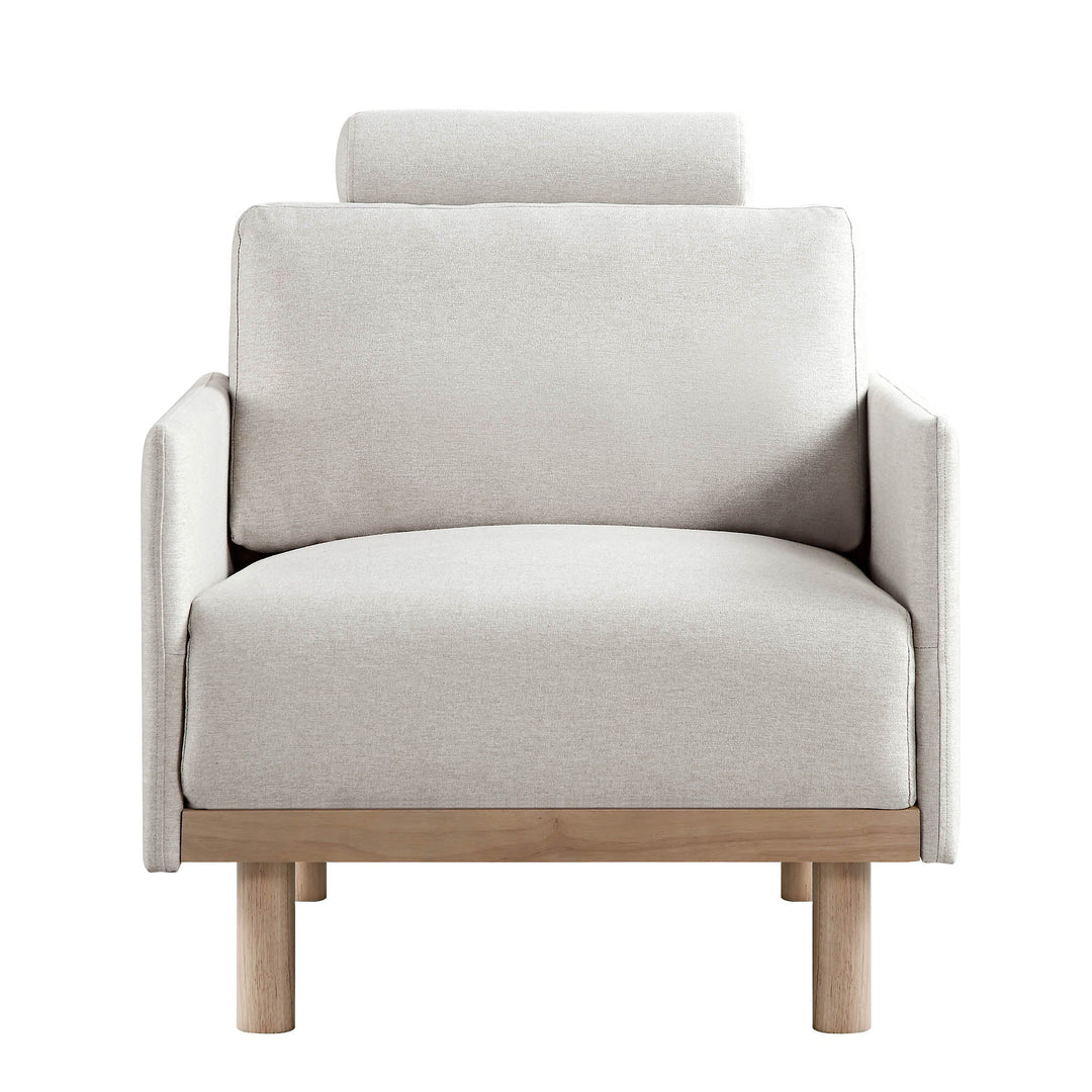 Beige armchair with wooden legs on a white background