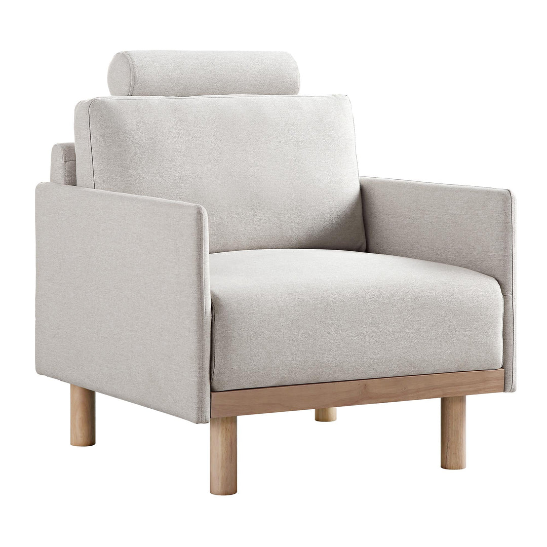 Beige armchair with wooden legs on a white background