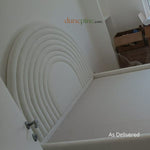 Load image into Gallery viewer, White upholstered headboard with circular design on a bed frame, brand 'dunepine' visible.