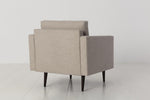 Load image into Gallery viewer, Beige armchair on a white floor with a white background