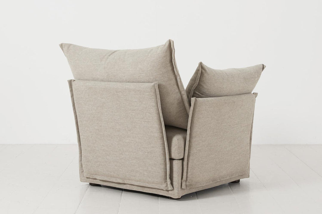 Beige armchair on a white background