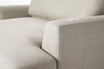 Load image into Gallery viewer, Close-up of a beige fabric sofa