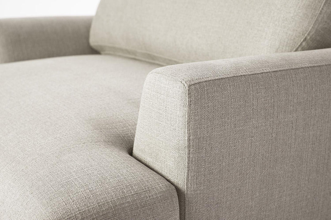 Close-up of a beige fabric sofa