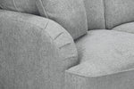 Load image into Gallery viewer, Gray fabric sofa with a focus on texture and stitching detail.