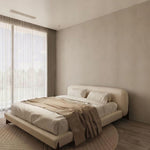 Load image into Gallery viewer, Modern bedroom with a beige bed and neutral decor