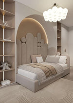 Load image into Gallery viewer, Modern bedroom with a bed, shelves, and decorative lighting.