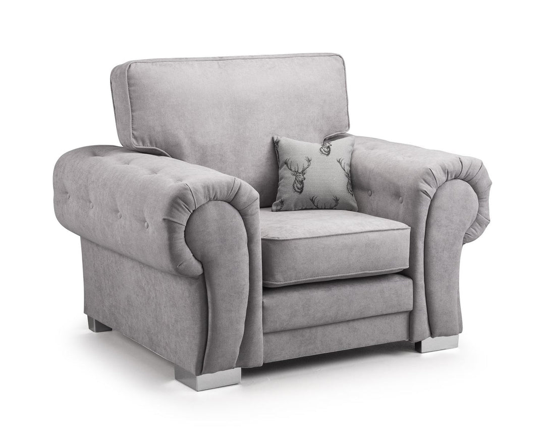 Gray armchair with a decorative pillow on a white background