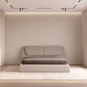 Louvera upholstered bed in textured beige fabric, full headboard view in a bright bedroom