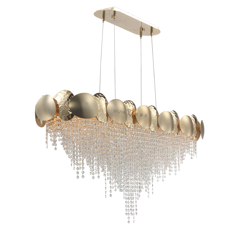 Gold chandelier with crystal accents on a white background