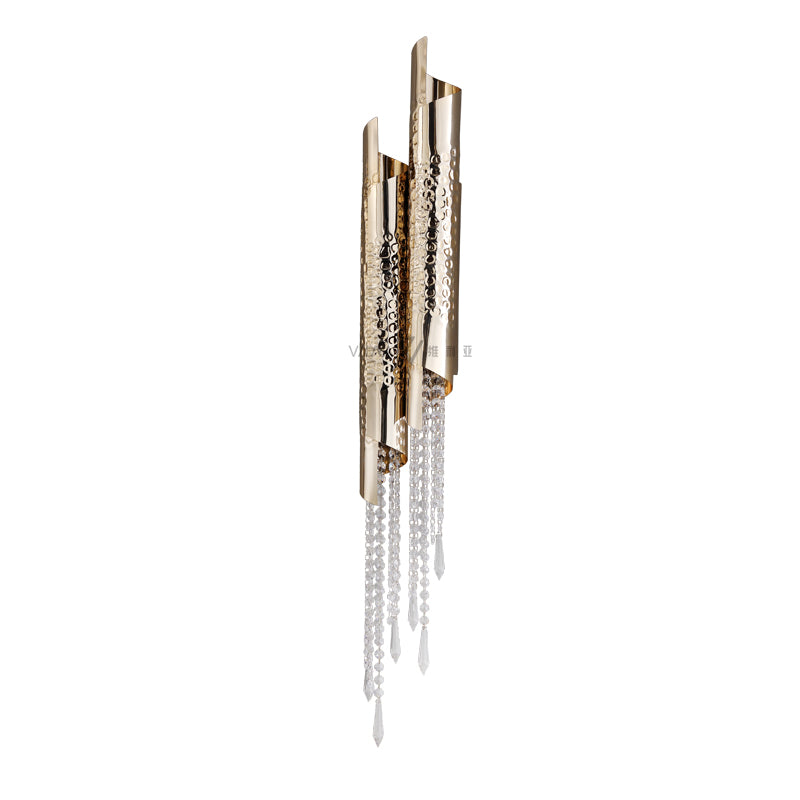 Decorative wall sconce with crystal accents on a white background