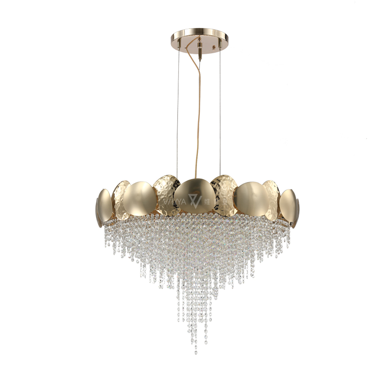 Gold chandelier with crystal accents on a white background