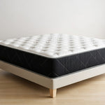 Load image into Gallery viewer, White mattress with black border on a wooden floor