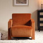 Load image into Gallery viewer, Brown armchair in a room with a side table and framed picture on the wall.
