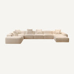Load image into Gallery viewer, Beige sectional sofa on a white background
