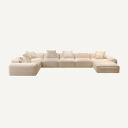 Beige sectional sofa on a white background