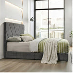 Load image into Gallery viewer, Modern bedroom with a gray upholstered bed and striped bedding.