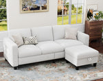 Load image into Gallery viewer, White sectional sofa in a living room with a rug and window view.

