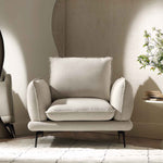 Load image into Gallery viewer, Beige armchair in a room with a neutral color scheme
