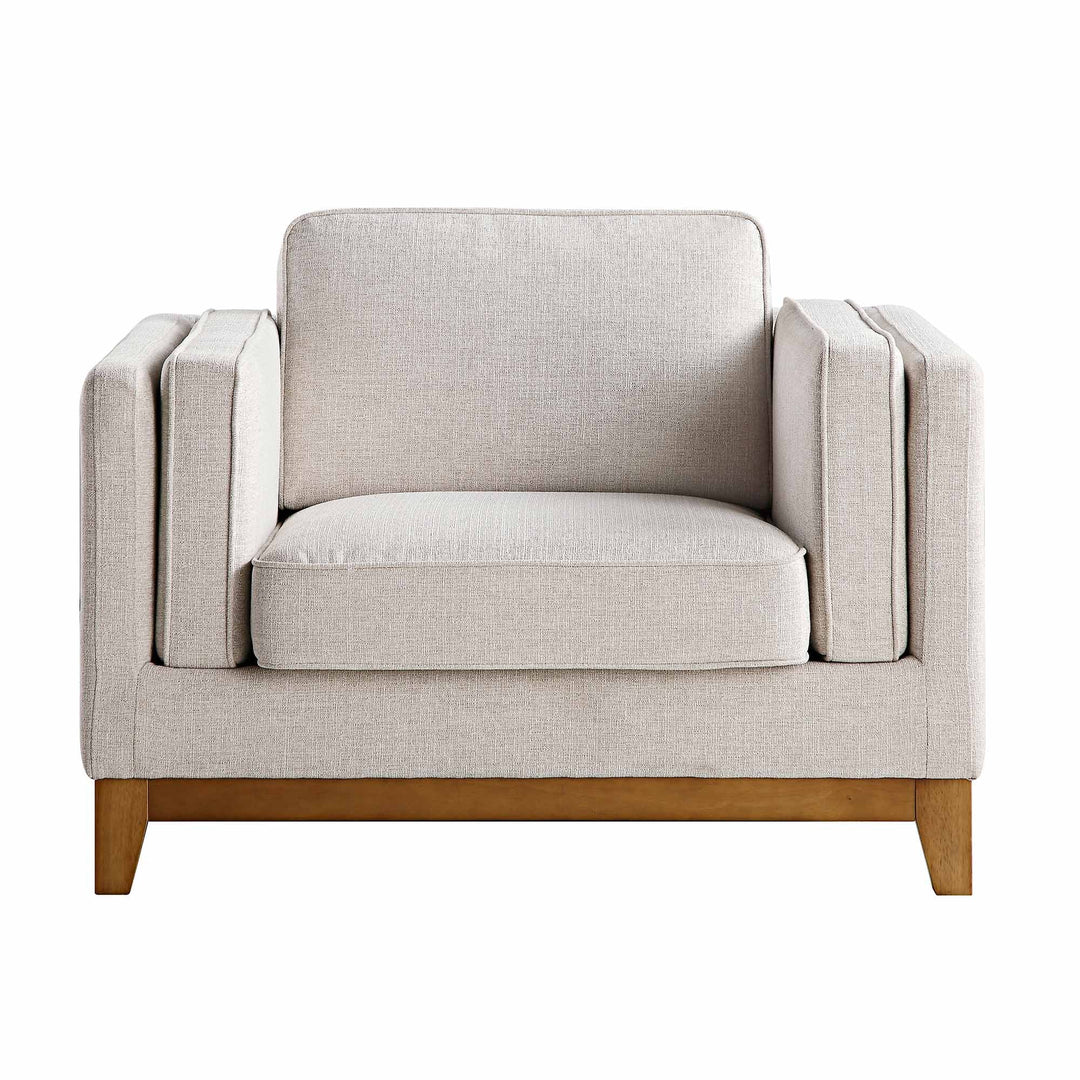 Beige armchair with wooden legs on a white background