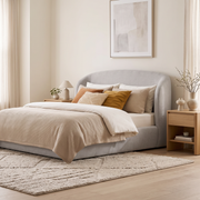 Grand Canal Upholstered Bed with Hydraulic Storage shown in light grey fabric in a bright bedroom – illustrative image – Dune & Pine