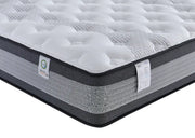 Gray and white mattress with a brand label on a white background