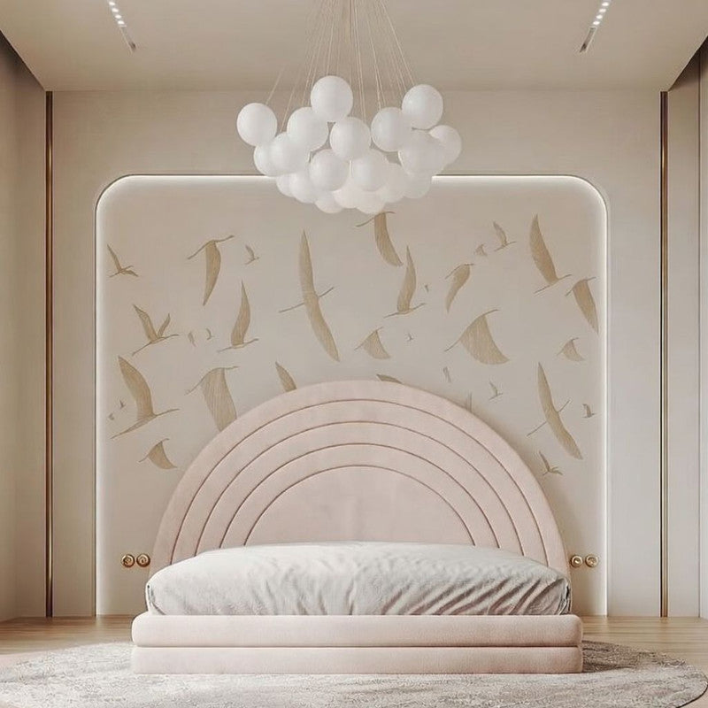 Modern bedroom with a pink bed and decorative wall panel.