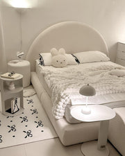 arch shaped headboard kids bed in a bed room