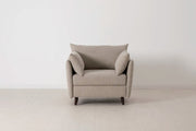 Beige armchair on a white background