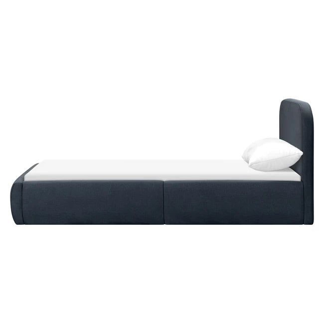 Modern bed with white mattress and dark blue frame on a white background