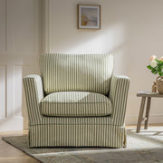 Striped armchair in a room with a table and decorative items.