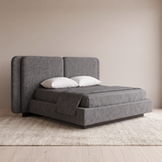 Slate Luxe upholstered bed with dual headboard and hydraulic storage, side view