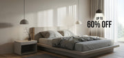 Modern bedroom with a bed and nightstand, featuring a sale banner.