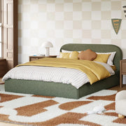 Green bed with yellow and white bedding in a room with checkered wallpaper and patterned rug.