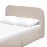 Load image into Gallery viewer, Beige upholstered headboard with white pillows on a white background