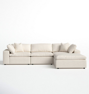 Beige sectional sofa on a white background