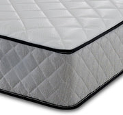 Gray quilted mattress cover on a white background