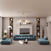 Modern living room with blue sofa set and decorative elements