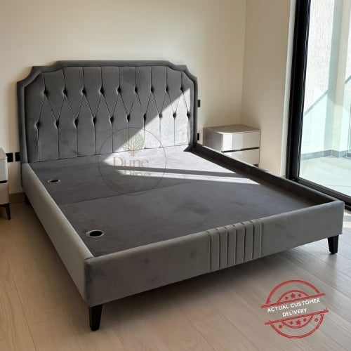 Upholstered bed kept in a bedroom without mattress