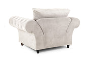 Beige armchair with a pillow on a white background
