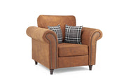 Brown armchair with plaid cushions on a white background