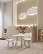 Load image into Gallery viewer, Children's play area with a table and chairs, teddy bear, and cloud-shaped lights.