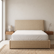 Meridian Headboard Upholstered Bed with Hydraulic Storage shown in warm beige fabric in a bright bedroom – illustrative image – Dune & Pine