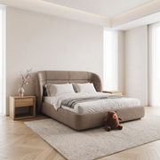 Royal Horizon Premium Upholstered Bed shown in taupe fabric in a bright bedroom – illustrative image – Dune & Pine