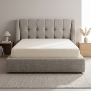 Aurora Minimal Upholstered Bed with Hydraulic Storage shown in greige fabric in a bright bedroom – illustrative image – Dune & Pine