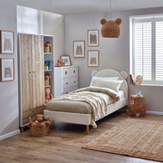Idris Upholstered Bed in a bedroom – Dune & Pine