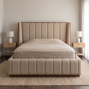 Soft-Tuft Channel Headboard Upholstered Bed shown in warm beige fabric in a bright bedroom – illustrative image – Dune & Pine
